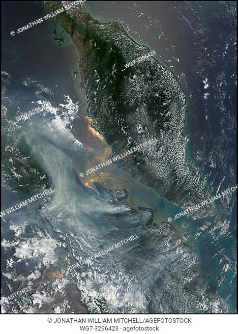 EARTH Indonesia -- 13 Mar 2002 -- The smoke was so thick over some parts of Sumatra, Indonesia, in late February 2002 that officials were forced to close...