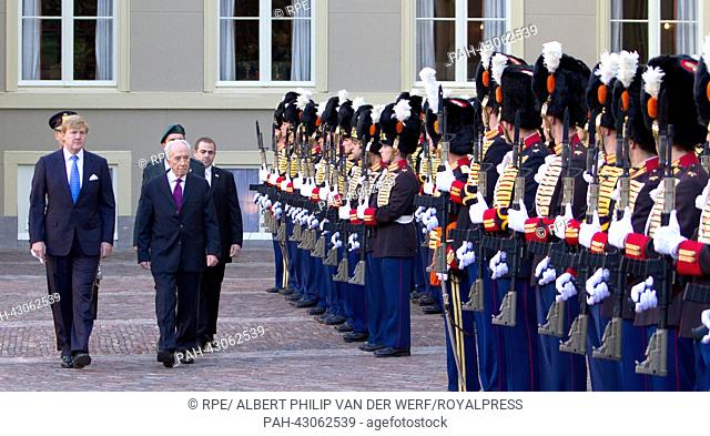 King Willem-Alexander of the Netherlands (R) recieves Israelian president Schimon Peres at Palace Noordeinde during his official visit to the Netherlands in The...