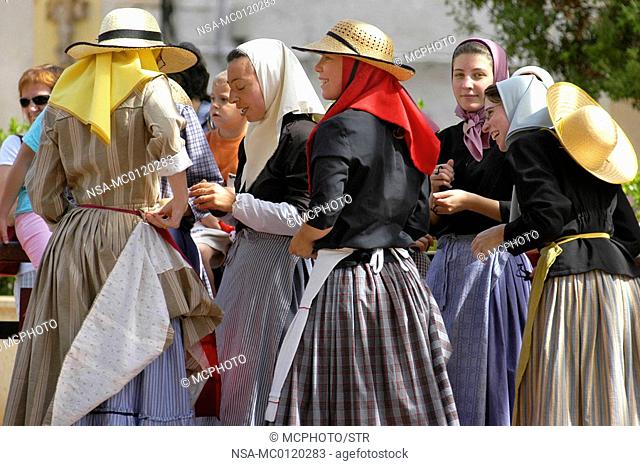traditional dancers in menorcan dresses during a folklore festival in Ferreries