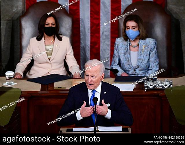US President Joe Biden addresses a joint session of Congress as US Vice President Kamala Harris (L) and Speaker of the United States House of Representatives...