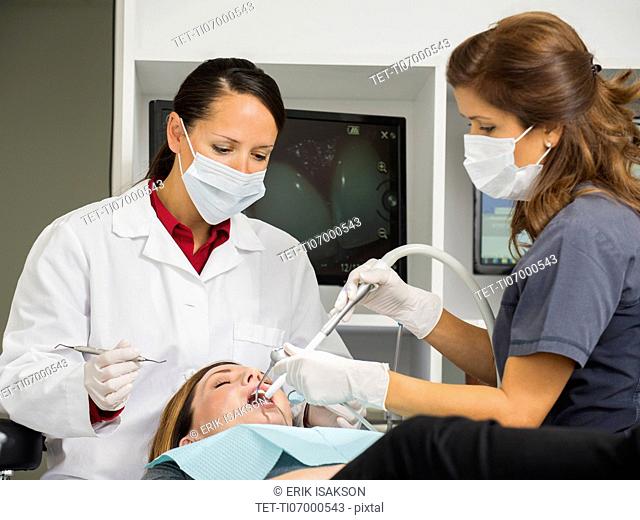 Dentist operation on patient