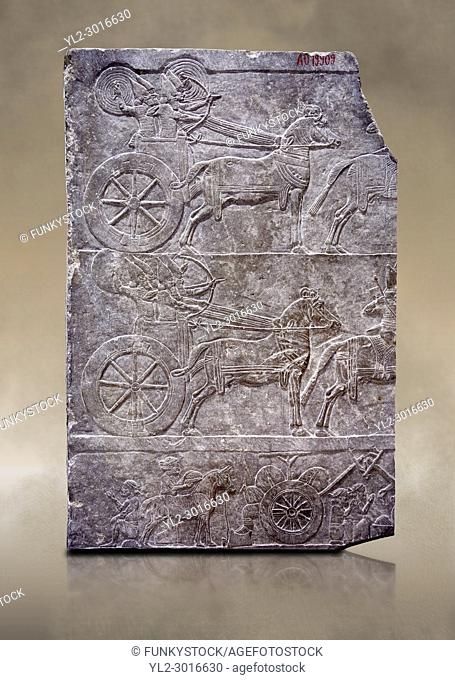 Stone relief sculptured panel of aa Assyrian Chariot. From the palace of Assurbanipal room VI/T1, Nimrud, third quarter of the 8th century BC