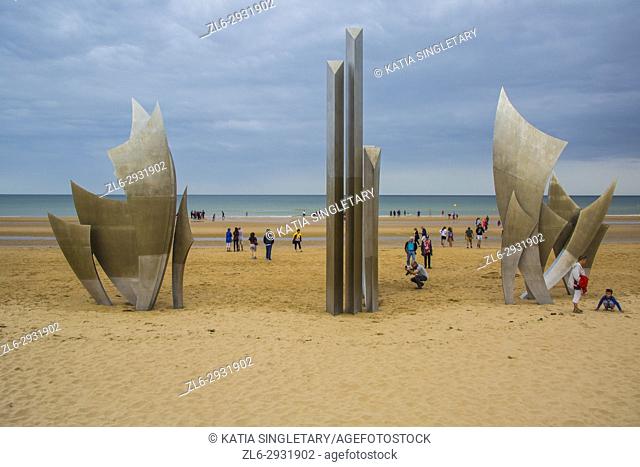 The very famous D-Day June 1944 war memorial on Omaha Beach, In Normandy France. Magnificent Blue sky with clouds day