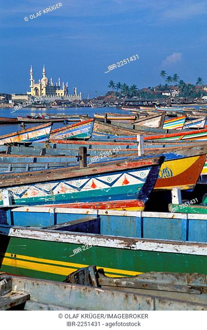 Colourful fishing boats, mosque, Kovalam, Kerala, South India, India, Asia