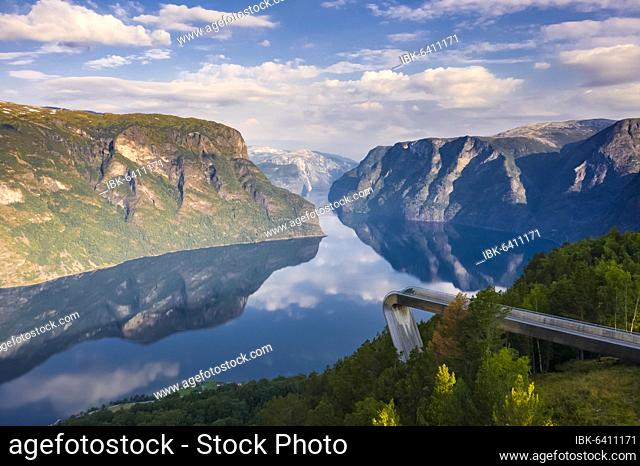 Viewing platform Stegastein, mountains reflected in the water, Aurlandsfjord, Aurland, Sogn og Fjordane, Norway, Europe