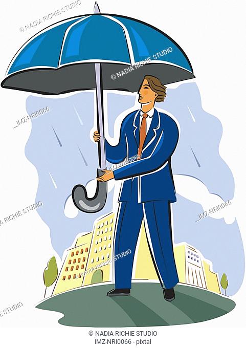 businessman holding an umbrella
