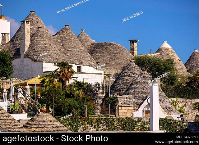 Famous trulli houses in the town of Alberobello in Italy