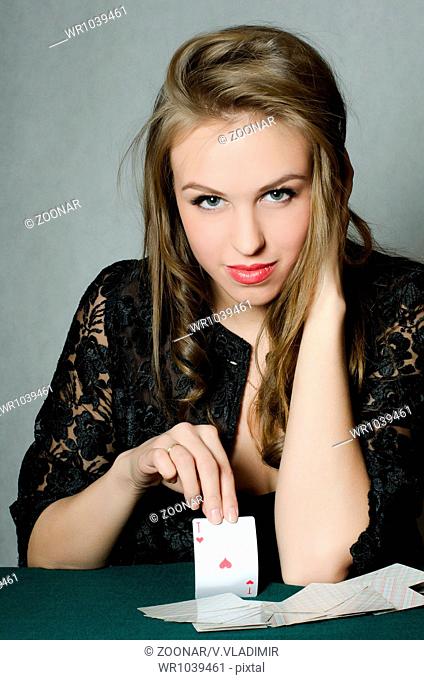 The beautiful girl with playing card