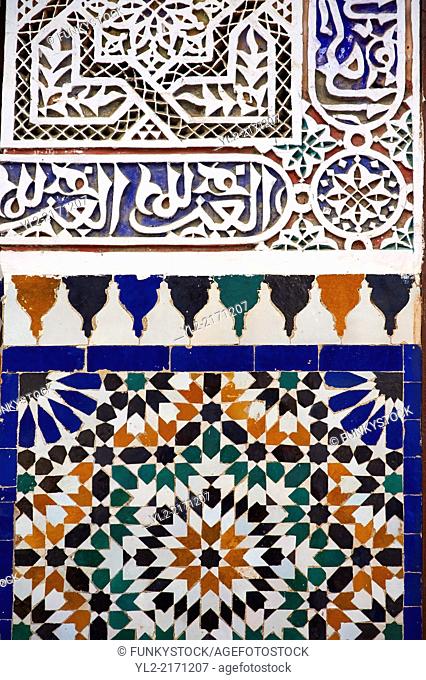 Berber Arabesque Morcabe plasterwok Zellige tiles of the Marrakesh museum in the Dar Menebhi Palace, Marrakesh, Morocco