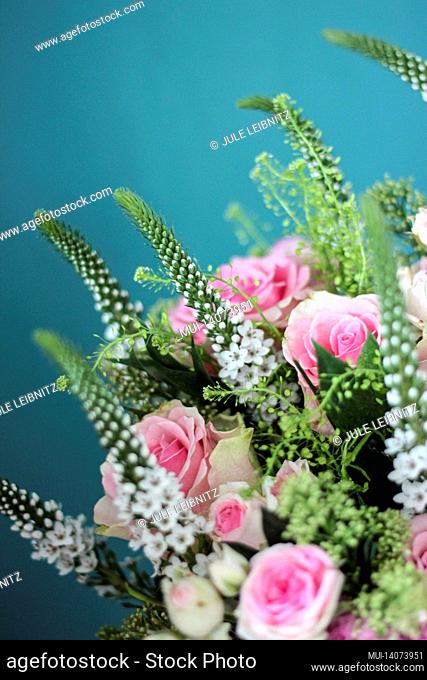 bouquet of flowers, teal background