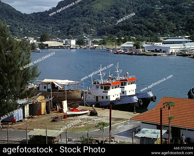 Ships in the port of Victoria. Seychelles. Pilots, tugboat