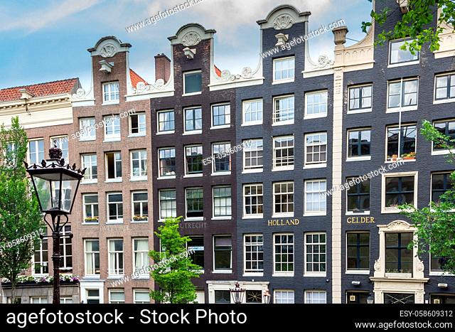 Typical dutch mansion houses along the canals in Amsterdam in the Netherlands