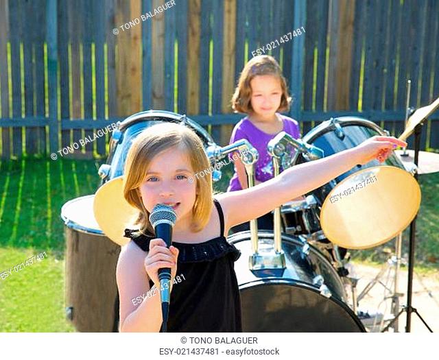 chidren singer girl singing playing live band in backyard
