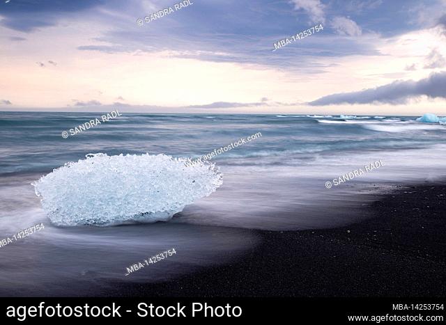 Ice and waves on Black Beach near Jökulsárlón glacial lagoon, Vatnajokull National Park, Iceland