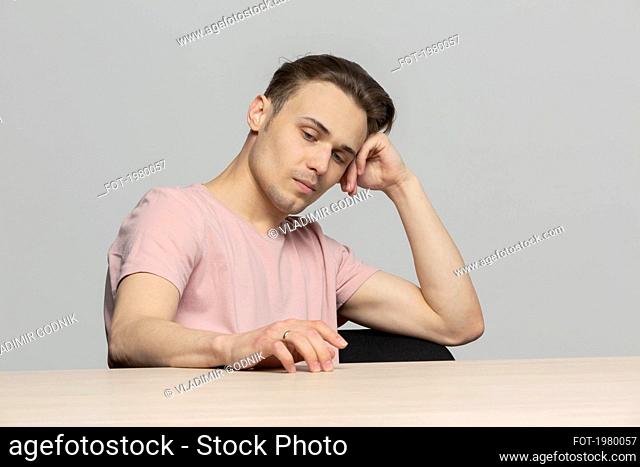 Worried young man thinking