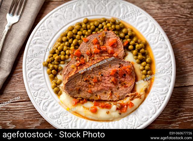 Roast Beef With Mashed Potatoes and Peas