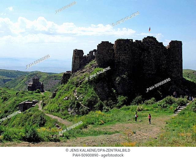 A view of Amberd castle (R) and the church of Surp Astvatsatsin (Holy Mother of God) (L) near Byurakan, Armenia, 28 June 2014