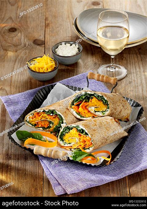 Colourful wraps with cream cheese and vegetables