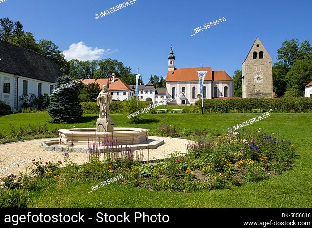 Monastery church with Roman tower and fountain with fountain figure of abbot Walto or Balto, Wessobrunn Monastery, Upper Bavaria, Bavaria, Germany, Europe