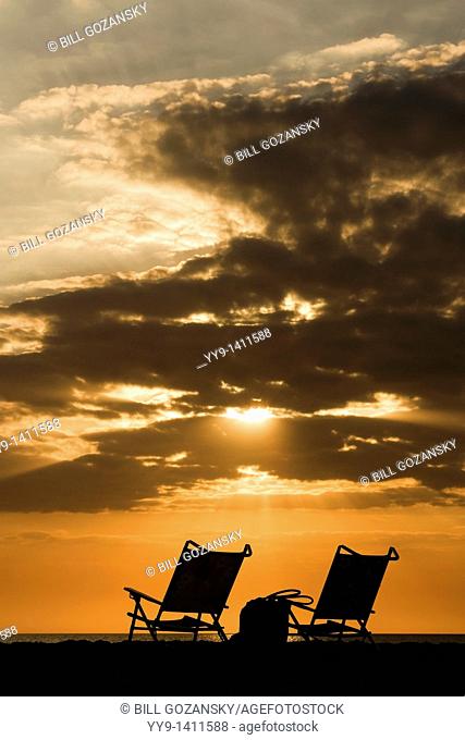 Sunset and Beach Chairs on Sanibel Island, Florida