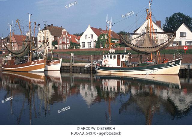 Fishing boats harbour of Greetsiel Lower Saxony Germany