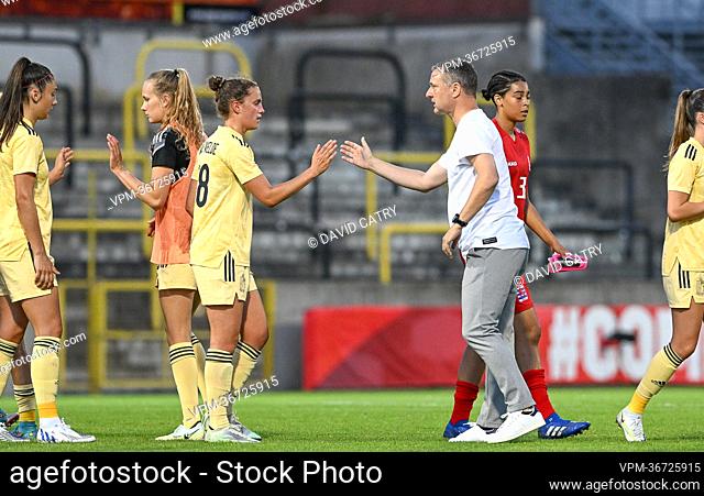Belgium's Chloe Vande Velde and Belgium's head coach Ives Serneels are pictured after the friendly match between Belgium's national women's soccer team the Red...