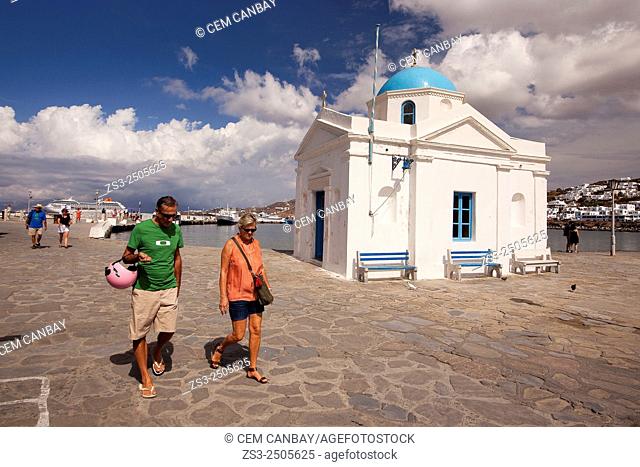 People near a blue domed church at town center, Mykonos, Cyclades Islands, Greek Islands, Greece, Europe