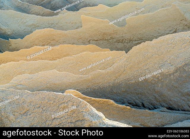 An abstract view of limestone and sandstone mountains with sharp edges