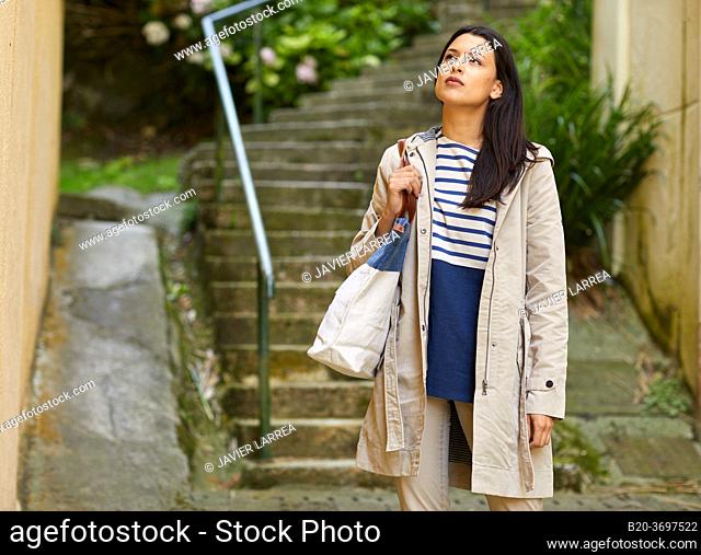 Young woman walking, Pasaia, Gipuzkoa, Basque Country, Spain, Europe