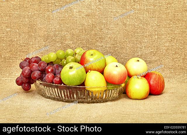 Different fruits arranged on plate