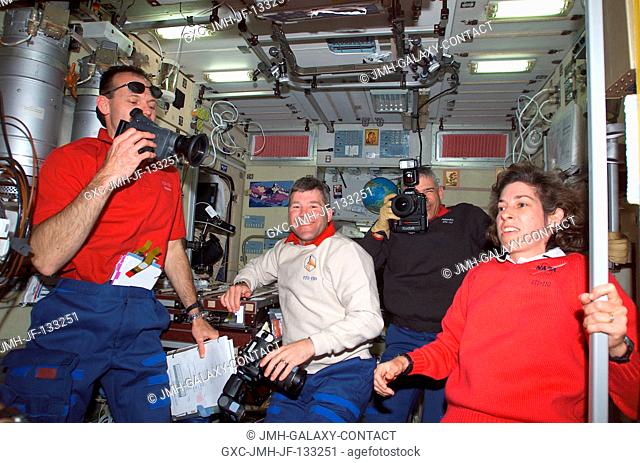 Astronauts Steven L. Smith (left), STS-110 mission specialist, Stephen N. Frick, pilot, Lee M. E. Morin, mission specialist