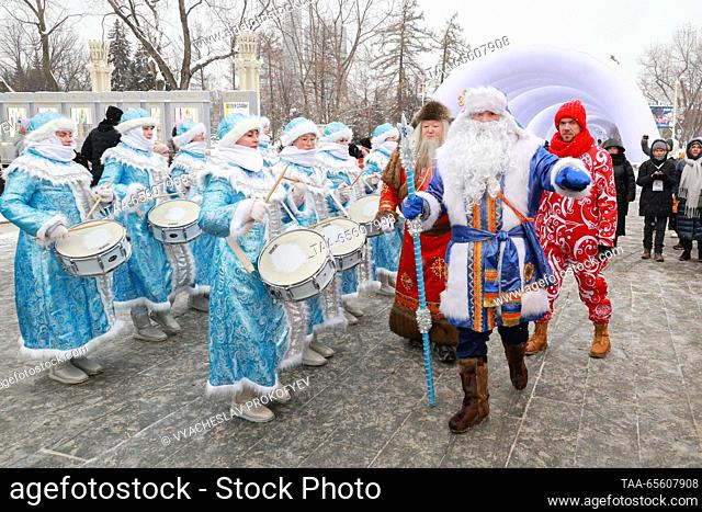 RUSSIA, MOSCOW - DECEMBER 10, 2023: Sook Irei (L), the Tuvan Father Frost, and Kodzyd Pol, the Komi Father Frost, attend a celebration of their birthdays during...
