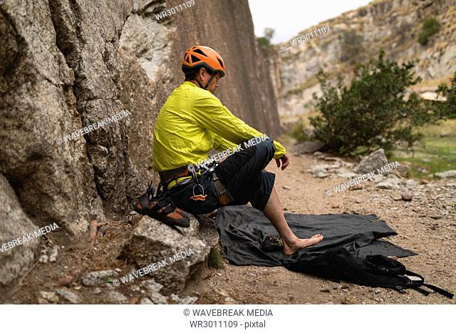 Man preparing for mountaineering