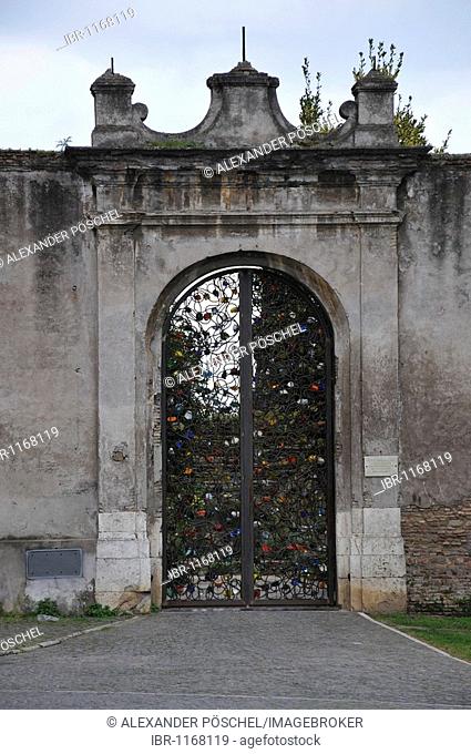 Gate next to the Church of Santa Croce in Gerusalemme, historic city centre, Rome, Italy, Europe