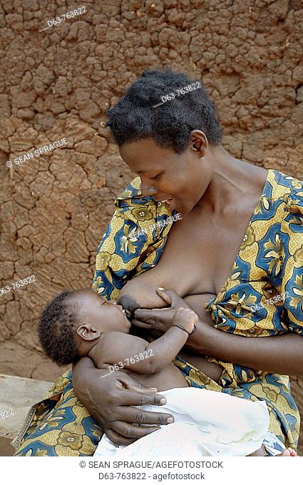 UGANDA  At the home of Nakabugo Betty, Kisoga village, Kayunga District  Breast feeding her baby  Kayunga District