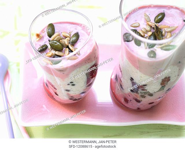 Layered berry and yoghurt dessert with mixed seeds