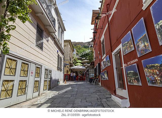 Cafes and tavernas on Mnisikleous Street in the Plaka district, Athens, Greece
