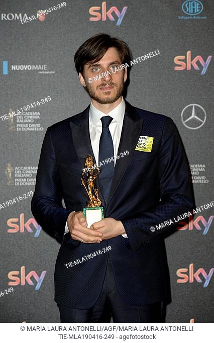 Luca Marinelli Best Supporting actor prize at the red carpet of winners for the David of Donatello prize, Rome, ITALY-18-04-2016