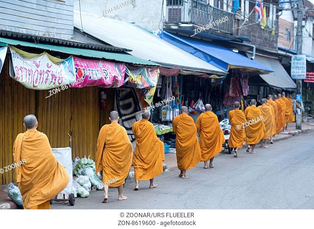 monks at the market in the Village of Thong Pha Phum north of the City of Kanchanaburi in Central Thailand in Southeastasia