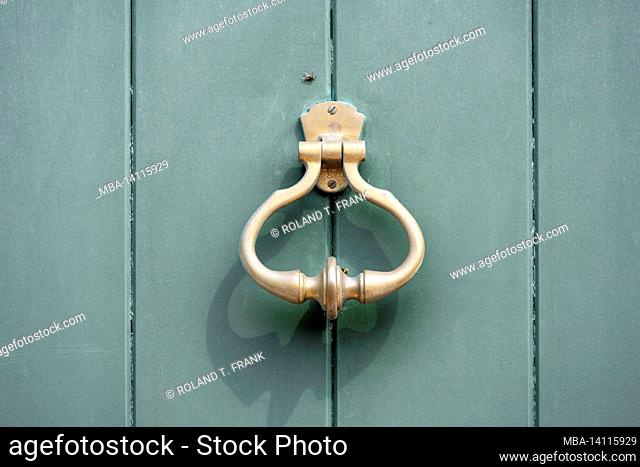 wooden door with door knocker