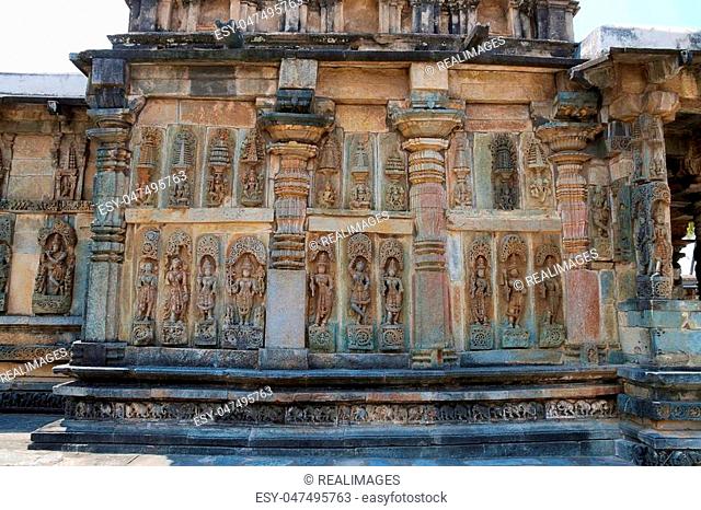 Ornate wall panel reliefs depicting Hindu deities, Ranganayaki, Andal, temple, Chennakesava temple complex, Belur, Karnataka, india South wall