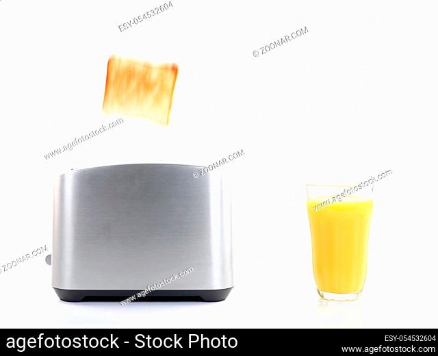 Plain white toast popping up from a toaster isolated against a white background