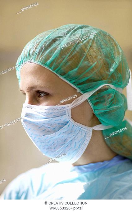 Side shot of female surgeon