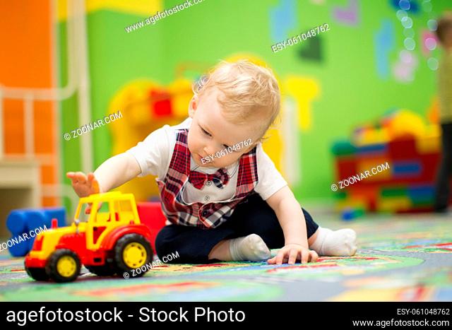 Belarus, Gomel, 189 May 2018. Children's entertainment center store. Celebrating the birthday of children.A child is playing with a car