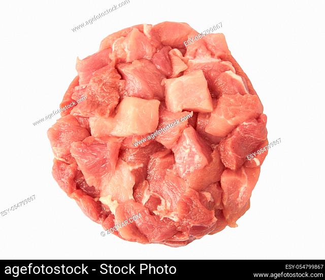 Diced fresh meat laid out in a circle isolated on white