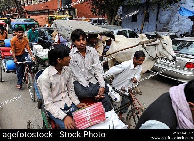 Delhi, India, Asia - Hustle and bustle with crowds of people during rush hour on a busy street near the New Delhi Railway Station in the centre of the Indian...