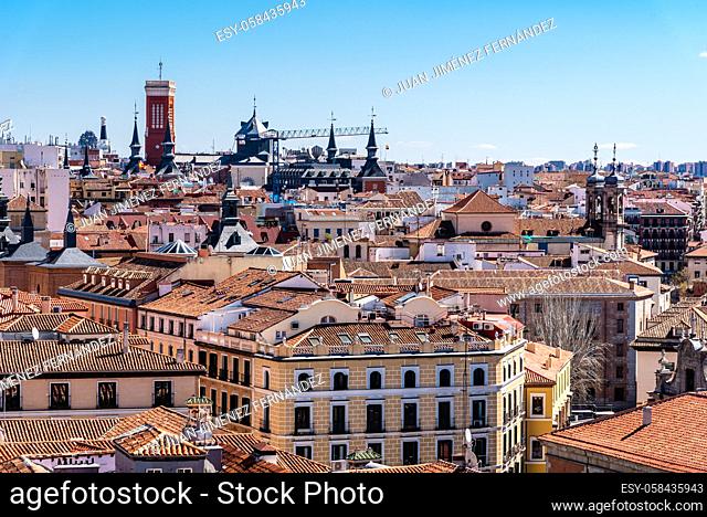 Skyline of historic center of Madrid from Almudena Cathedral. View against the blue sky