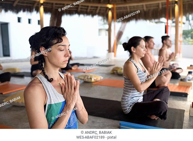 Yoga class meditating