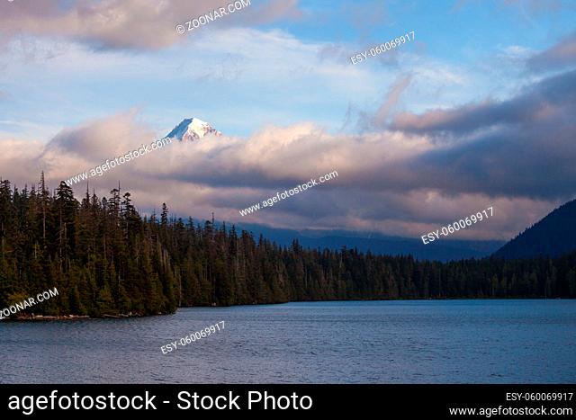 Mount Hood shrouded in low clouds at Lost Lake in Oregon, USA
