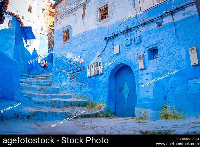 Blue staircase in Chefchaouen Street, Medina, Morocco surrounded by blue walls